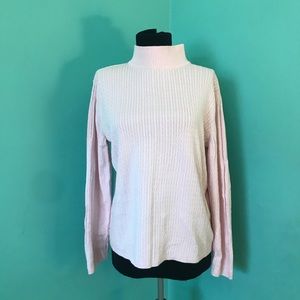 Pink turtleneck sweater